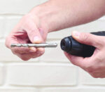 Električna udarna bušilica Black+Decker BEHS01K 650W SDS-Plus sa nastavcima u koferu